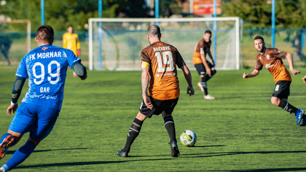 Men playing Football