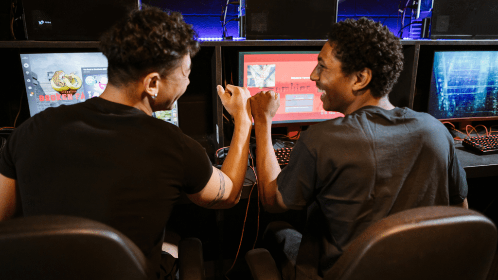 Two people playing video game 