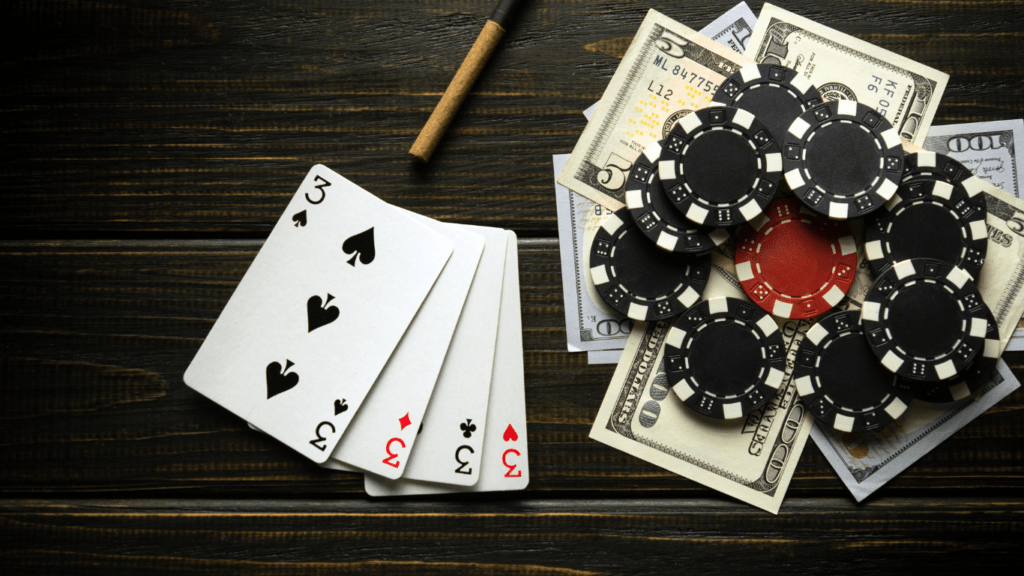 playing cards, money and casino chips